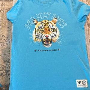Under Armour men’s 


 Teal Project Rock Tiger Tee